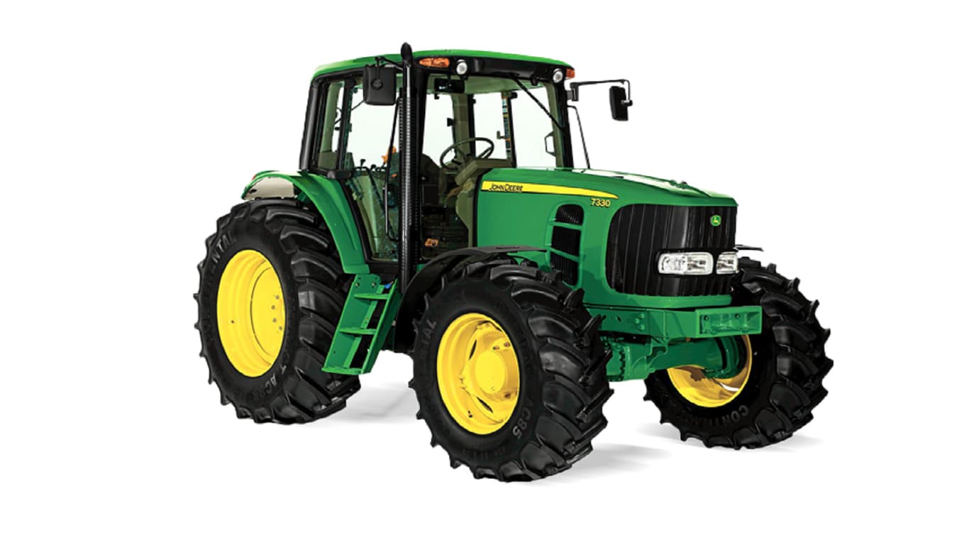 The John Deere logo appears on the floor mat of a new tractor at